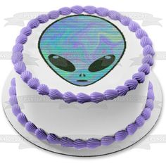 a cake with an alien face on it