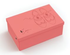 a pink box with a drawing of shoes on it