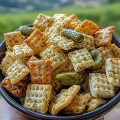 a close up of a bowl of crackers