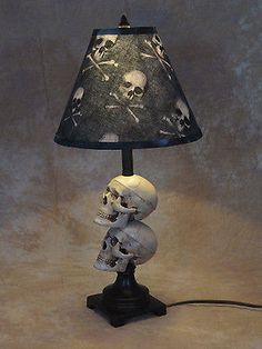 a lamp that has skulls on it