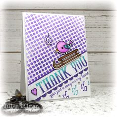 a thank you card with a pink bird on the front and purple dots in the back