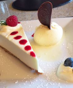 three desserts are arranged on a white plate