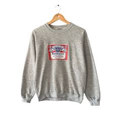 Code : 299 Vintage Budweiser Grey Sweatshirt Women Size Medium Budweiser Crewneck Budweiser Sweater Pullover Print Logo King Of Beer Budweiser Jumper Size on Tag : M Details Measurement  Arm Pit to Arm Pit : 21"inches Back Collar to Hem : 24"inches Condition :  Great Vintage Condition(Used Clothing).No Holes And No Stain.Please refer pictures detail.‼️ Vintage Gray Crew Neck Sweater, Retro Crew Neck Top, Logo King, Beer Hoodie, Vintage Budweiser, Sweatshirt Women, Sweater Pullover, Vintage Sweatshirt, Used Clothing