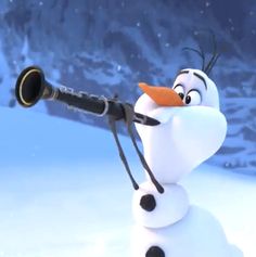 a snowman is holding a telescope in his hand