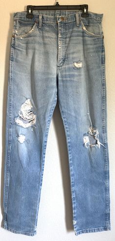 Heavy Distressed Wrangler Jeans 35x35 Blue Cowboy Cut Western Rodeo 13MWZ Grunge. Tagged size 36x36- please read ACTUAL measurements below to determine if these will work for you. Waist flat lay: 17.5” Front Rise: 13” Inseam: 35” Condition is Preowned, please see all quality photos to show heavy distress, nice and worn-in! May be light staining. Happy to answer any questions you may have! Shipped with USPS Priority Mail. Thanks for looking and please check out our store for more great items! -Pl Distressed Wrangler Jeans, Western Rodeo, Wrangler Jeans, Work For You, Priority Mail, Rodeo, Flat Lay, Mom Jeans, Cowboy