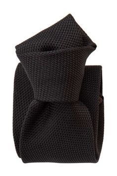 Embrace classic elegance with this black grenadine tie that will give your look understated sophistication and will make a lasting impression. Extra Long Length: Approx. 3.38" x 62.5". A classic tie width and length that is perfect for most men taller than 6'2". 100% silk grenadine garza fina: Garza fina (fine gauze) is a loose weave fabric made from high-twist yarns. It has a slightly knobby texture. Tipped with our signature pinstripe silk: Not only is it a refined finishing touch, it keeps yo Black Dapper Suit And Tie Accessories For Business, Elegant Black Standard Tie And Suit Accessories, Dapper Black Semi-formal Ties, Luxury Ties For Black Tie Events, Classic Black Suit And Tie Accessories, Classic Fitted Black Suit And Tie Accessories, Elegant Black Suit And Tie Accessories, Elegant Black Suit And Tie Accessories For Office, Black Ties Neckwear For Black-tie Events