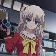 an anime character holding a cell phone in one hand and wearing a bow tie on the other