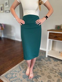 Emerald Green stylish pencil skirt made with a comfortable, stretchy knit fabric that compliments any body shape or size.    MATERIAL:  polyester, spandex, stretch knit CARE INSTRUCTIONS:  Machine wash cold, Non-Chlorine Bleach, Hang to dry THANK YOU for visiting our shop!  We hope to offer you an amazing experience with the highest quality, fast shipping and delightful customer service. RETURN POLICY:  Returns or exchanges NOT ACCEPTED.  But please contact me if you have problems with your order. Green Lined Pencil Skirt For Office, Elegant Green Lined Pencil Skirt, Green Midi Pencil Skirt, Green Lined Pencil Skirt, Chic Green Knee-length Pencil Skirt, Green Pencil Skirt, Green Pencil Skirts, Green Pencil, Black Pencil Skirt