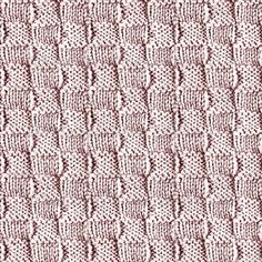 a knitted blanket that is pink and white