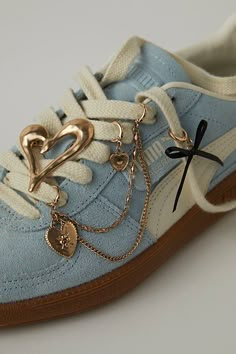 Add a little something special to your shoe game with this set of charms featuring dangly details, drapey chains, and defined pins for the perfect finishing touch. | Shoe Charm & Pin Pack by Free People Bottom Of Shoes Reference, Cool Shoelaces, Girly Tennis Shoes, 2008 Shoes, Shoe Charm Ideas, Lace Shoe Laces, Cute Shoes Outfits, Shoes Trends, Dream Shoe Collection