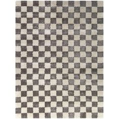 a checkered rug is shown in grey and white