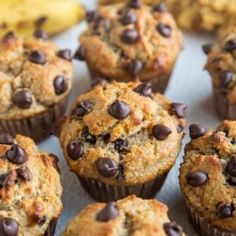 muffins with chocolate chips and bananas on a table