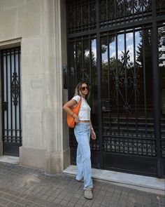 Orange Shoulder Bag Outfit, Orange Bottega Bag Outfit, Orange Bottega Bag, Orange Purse Outfit Summer, Orange Tote Bag Outfits, Matilda Djerf Birkenstock, Orange Bag Outfit Summer, Outfit With Orange Bag, Orange Handbag Outfit