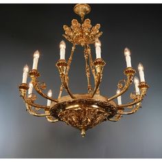 an ornate chandelier with many candles lit