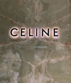 the words celline are lit up against a marble background