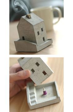 two pictures of a house in a box with a tiny purple object sticking out of it