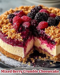 mixed berry crumble cheesecake on a plate