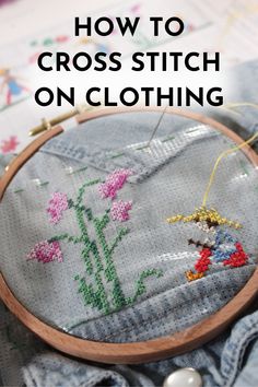 a cross stitch of a person sitting next to a flower on a chambray shirt with text that says: how to cross stitch on clothing Cross Stitch On Clothes, Quilters Knot, Thread Painting, Embroidery Scissors, Plain Fabric, Cross Stitch Fabric, Modern Cross Stitch Patterns, Embroidery For Beginners, Pdf Patterns