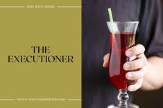 a person holding a wine glass with a drink in it and the words, the executoner