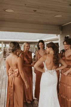 a group of women standing next to each other