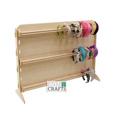 a wooden shelf with several bracelets on it