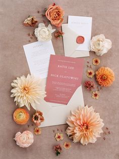 the wedding stationery was done in peach and white with an orange flower on top