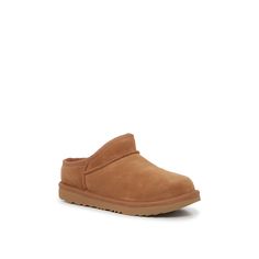 UGG-Classic Bootie Slipper - Kids' Make sure your kiddo's casual days are oh-so-cozy with the Classic bootie slippers from Ugg. Crafted with a suede material and a soft faux fur lining, this pair is designed to keep them warm throughout the seasons. Complete with a closure-free design they can easily add to their looks and a solid sole so they enjoy traction and durability. Not sure which size to order? Click here to check out our Kids’ Measuring Guide! For more helpful tips and sizing FAQs, cli Bootie Slippers, Ugg Classic, Suede Material, The Seasons, Helpful Tips, Our Kids, Chestnut, Bootie, Faux Fur