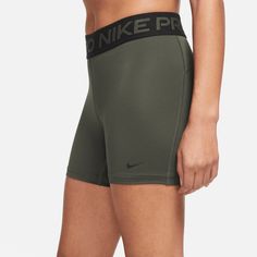 Style No. CZ9831-325 Color: Cargo Khaki/Black The Nike Pro 365 Shorts wrap you in stretchy fabric with Dri-FIT technology to keep you feeling supported and dry during intense workouts. Tight fit for a body-hugging feel. 5-inch Inseam. 83% polyester/17% spandex. Nike Pro 365 Women's 5" Shorts. Red Nike Pros, Nike Spandex, Nike Tempo Shorts, Black Nike Shorts, Workout Shorts Women, Nike Athletic Shorts, Nike Pro Shorts, Nike Sweats, Black Athletic Shorts