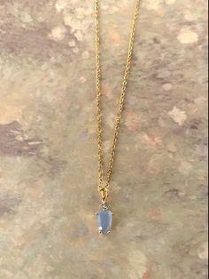 "Very dainty gold tone and ice blue stone necklace with rhinestone detail, light blue necklace, light blue jewelry, blue stone necklace, necklace blue, sky blue necklace, light blue gifts Pendant measures 1/2\" L X 1/4\" W and is on an 18\" chain.   ★ Want to see more?  Please visit my shop at: https://www.etsy.com/shop/DesignsByPeg" Dainty Blue Necklace, Light Blue And Gold Necklace, Gold Blue Jewelry, Light Blue And Gold Jewelry, Something Blue Necklace, Blue Dress Jewelry Ideas, Light Blue And Gold Dress, Hoco Accessories, Blue Stone Jewellery