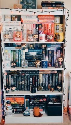 a book shelf filled with lots of books