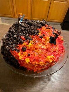 a cake that looks like it has been made to look like fire and ice cream