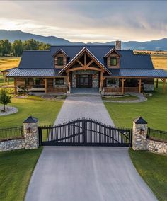 a large home with a driveway leading to it