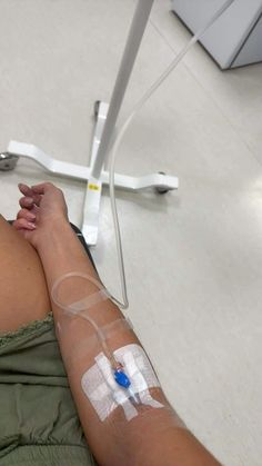 a person with an iv attached to their arm