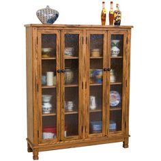 a wooden cabinet with glass doors and shelves