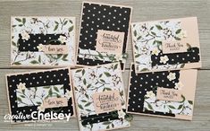 four cards with white flowers and black polka dots on them, one is for someone's birthday