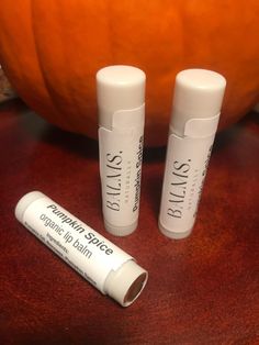 Pumpkin Spice Lip Balm - Handmade | Small Batch | 100% Natural & Organic Indulge your lips with the warm, comforting flavors of fall with our Pumpkin Spice Lip Balm. Crafted in small batches and made with 100% natural and organic ingredients, this luxurious lip balm provides the perfect blend of hydration and seasonal scent. Infused with Pumpkin Oil, renowned for its nourishing and rejuvenating properties, this balm helps to deeply moisturize and soften your lips. Beeswax creates a protective ba Pumpkin Spice Treats, Lip Balm Ingredients, Pumpkin Oil, Orange Lips, Organic Lip Balm, Lip Balm Gloss, Sweet Orange, Natural Products, Small Batch