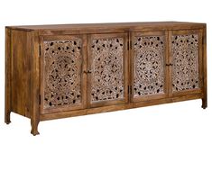 an old wooden sideboard with carvings on it