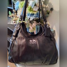 Look At This Beautiful Black Leather Coach Maggie Madison Shoulder Bag With Purple Interior. She's In Excellent Used Condition And She's Absolutely Stunning! She Has 3 Large Separate Compartments Inside. She's A Big Girl. Absolutely No Call Outs. She Measures 14.5"W X 10.5"H And That's Stuffed. Please Look At All The Pictures As They Are Part Of The Description. Price Reflects The Fact That I'm A Social Smoker Although My Bags Are Crate Kept. Purple Interior, My Bags, Black Leather Shoulder Bag, Leather Coach, List Ideas, Big Girl, Christmas List, Coach Handbags, Coach Bags