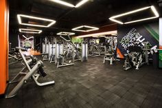 an indoor gym with treadmills and exercise machines