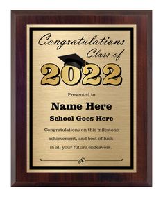 an award plaque with the words congratulations class of 2012 and a graduation cap on it