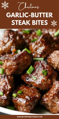 garlic butter steak bites on a white plate