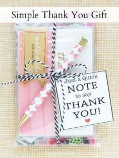 a thank card with a note attached to it and the words, simple thank you gift