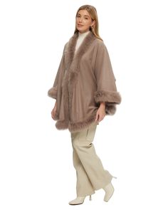 Our cashmere cape is an elegant piece, featuring luxurious Toscana lamb trim. The unstructured style can be worn draped over the shoulder, belted or wrapped around the body. Features: Concealed hook closure Snaps for sleeves 90% Wool, 10% CashmereToscana lamb from Spain, Dyed Professional cleaning only Imported SIZE One size fits all Garment is approximately 28" from shoulder to hem Style: 20AU89310-TOSWOC Cashmere Cape, Body Features, Wool Cape, Hem Style, Cashmere Wool, Professional Cleaning, Black And Navy, Montreal, One Size Fits All