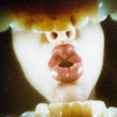 a close up of a person's mouth and tongue