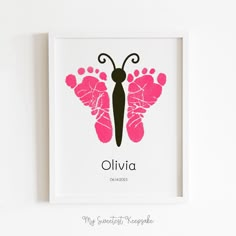 a pink and black butterfly with the name oliva on it's wings