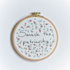 a cross stitch pattern with the words smash the patriachy written in black ink