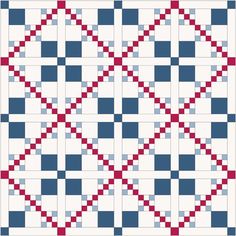 a red, white and blue quilt with squares on it