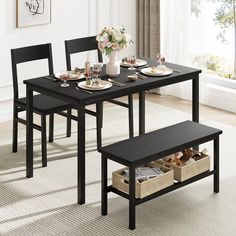 a dining room table with two benches next to it and some baskets under the table