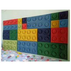 a lego headboard made out of different colored blocks