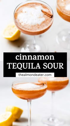 two glasses filled with cinnamon tequila sour on top of a white table next to lemon wedges